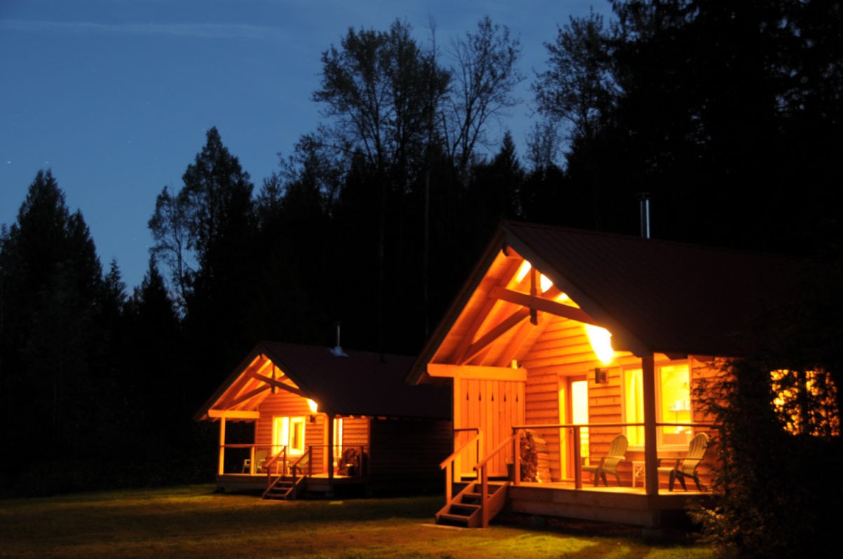 Cabins at night at Wild Bear Lodge